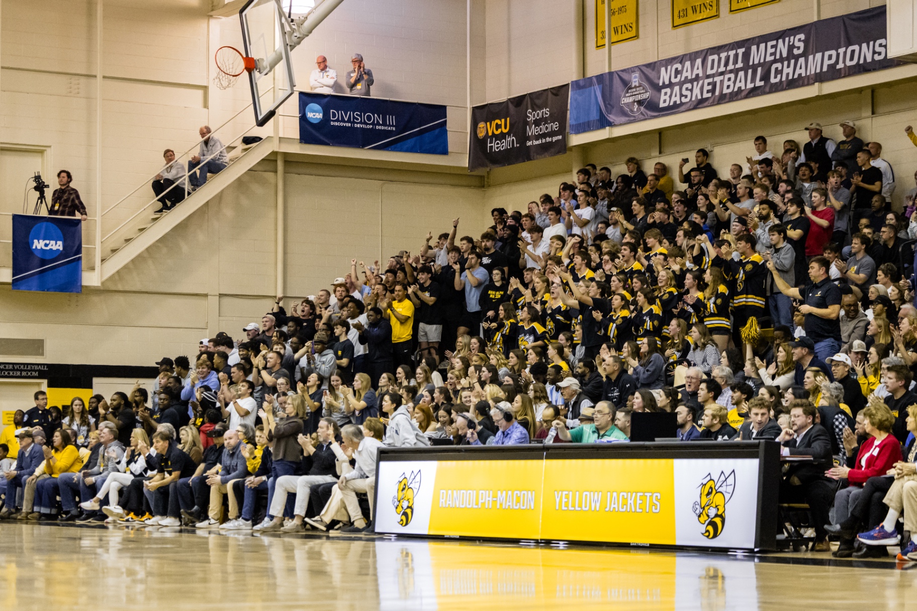 Packed Randolph–Macon student section erupting during the NCAA Sweet 16